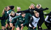 3 December 2023; Players run around interim assistant coach Emma Byrne during a Republic of Ireland women training session at the FAI National Training Centre in Abbotstown, Dublin. Photo by Stephen McCarthy/Sportsfile