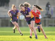 3 December 2023; Grace Kos of Kilmacud Crokes in action against Hannah Noone of Kilkerrin-Clonberne during the Currentaccount.ie All-Ireland Ladies Senior Club Championship semi-final match between Kilmacud Crokes of Dublin and Kilkerrin-Clonberne of Galway at Parnell Park, Dublin. Photo by Matt Browne/Sportsfile