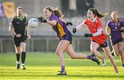 3 December 2023; Grace Kos of Kilmacud Crokes in action against Hannah Noone of Kilkerrin-Clonberne during the Currentaccount.ie All-Ireland Ladies Senior Club Championship semi-final match between Kilmacud Crokes of Dublin and Kilkerrin-Clonberne of Galway at Parnell Park, Dublin. Photo by Matt Browne/Sportsfile