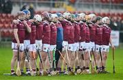 3 December 2023; Ruairí Óg players stand for Amhrán na bhFiann before the AIB Ulster GAA Hurling Senior Club Championship final match between Ruairi Óg, Antrim, and Slaughtneil, Derry, at Páirc Esler in Newry, Down. Photo by Ben McShane/Sportsfile