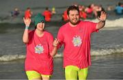 3 December 2023; Rachel McMulland and David Morgan from Lurgan, Armagh, at the Portrush Polar Plunge which saw participants get “Freezin’ for a Reason” to raise funds for Special Olympics Ireland athletes in an event sponsored by Gala Retail at Portrush East Strand Beach in Portrush, Antrim. Photo by Oliver McVeigh/Sportsfile