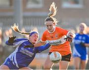3 December 2023; Niamh Murray of Clann Éireann evades the tackle of Gretta Nugent of Ballymacarbry during the Currentaccount.ie All-Ireland Ladies Senior Club Championship semi-final match between Clann Éireann of Armagh and Ballymacarbry of Waterford at Clann Éireann GAC, Armagh. Photo by Tyler Miller/Sportsfile