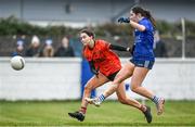 3 December 2023; Nina Wallace of Claremorris shoots under pressure from Maria Mulholland of Lavey during the Currentaccount.ie All-Ireland Ladies Junior Club Championship semi-final match between Claremorris of Mayo and Lavey of Derry at Canon Gibbons Park, Claremorris, Mayo. Photo by Harry Murphy/Sportsfile