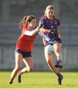3 December 2023; Grace Kos of Kilmacud Crokes in action against Eva Noone of Kilkerrin-Clonberne during the Currentaccount.ie All-Ireland Ladies Senior Club Championship semi-final match between Kilmacud Crokes of Dublin and Kilkerrin-Clonberne of Galway at Parnell Park, Dublin. Photo by Matt Browne/Sportsfile