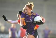 3 December 2023; Niamh Cotter of Kilmacud Crokes in action against Chloe Castello of Kilkerrin-Clonberne during the Currentaccount.ie All-Ireland Ladies Senior Club Championship semi-final match between Kilmacud Crokes of Dublin and Kilkerrin-Clonberne of Galway at Parnell Park, Dublin. Photo by Matt Browne/Sportsfile