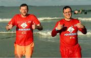 3 December 2023; Robert and Lewis Wilkinson from Ballymena at the Portrush Polar Plunge which saw participants get “Freezin’ for a Reason” to raise funds for Special Olympics Ireland athletes in an event sponsored by Gala Retail at Portrush East Strand Beach in Portrush, Antrim. Photo by Oliver McVeigh/Sportsfile