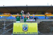 3 December 2023; St Brigid's joint-captains Mark Daly, left, and Paul McGrath lift the Shane McGettigan cup after their side's victory in the AIB Connacht GAA Football Senior Club Championship final between St Brigid's, Roscommon, and Corofin, Galway, at Dr Hyde Park in Roscommon. Photo by Piaras Ó Mídheach/Sportsfile