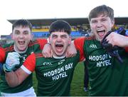 3 December 2023; St Brigid's players, from left, Brian Stack, Seán Trundle and Pearse Frost celebrate after their side's victory in the AIB Connacht GAA Football Senior Club Championship final between St Brigid's, Roscommon, and Corofin, Galway, at Dr Hyde Park in Roscommon. Photo by Piaras Ó Mídheach/Sportsfile