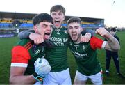 3 December 2023; St Brigid's players, from left, Seán Trundle, Pearse Frost and Paul McGrath celebrate after their side's victory in the AIB Connacht GAA Football Senior Club Championship final between St Brigid's, Roscommon, and Corofin, Galway, at Dr Hyde Park in Roscommon. Photo by Piaras Ó Mídheach/Sportsfile
