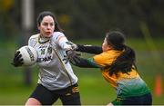 3 December 2023; Aoife McCormack of Na Fianna in action against Lucy Greene of Glanmire during the Currentaccount.ie LGFA All-Ireland Intermediate Club Championship semi-final match between Glanmire, Cork, and Na Fianna, Meath, at Mallow GAA Grounds in Mallow, Cork. Photo by Eóin Noonan/Sportsfile