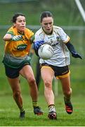 3 December 2023; Emma Regan of Na Fianna in action against Ally McCarthy of Glanmire during the Currentaccount.ie LGFA All-Ireland Intermediate Club Championship semi-final match between Glanmire, Cork, and Na Fianna, Meath, at Mallow GAA Grounds in Mallow, Cork. Photo by Eóin Noonan/Sportsfile