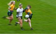 3 December 2023; Hazel Geraghty of Na Fianna in action against Abbie O'Mahony of Glanmire during the Currentaccount.ie LGFA All-Ireland Intermediate Club Championship semi-final match between Glanmire, Cork, and Na Fianna, Meath, at Mallow GAA Grounds in Mallow, Cork. Photo by Eóin Noonan/Sportsfile