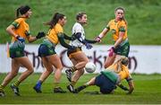 3 December 2023; Maire Kirby of Na Fianna has a shot on goal blocked by Kayla O'Connor of Glanmire during the Currentaccount.ie LGFA All-Ireland Intermediate Club Championship semi-final match between Glanmire, Cork, and Na Fianna, Meath, at Mallow GAA Grounds in Mallow, Cork. Photo by Eóin Noonan/Sportsfile