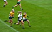 3 December 2023; Hazel Geraghty of Na Fianna in action against Abbie O'Mahony of Glanmire during the Currentaccount.ie LGFA All-Ireland Intermediate Club Championship semi-final match between Glanmire, Cork, and Na Fianna, Meath, at Mallow GAA Grounds in Mallow, Cork. Photo by Eóin Noonan/Sportsfile