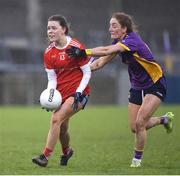 3 December 2023; Lynsey Noone of Kilkerrin-Clonberne in action against Kate Murray of Kilmacud Crokes during the Currentaccount.ie All-Ireland Ladies Senior Club Championship semi-final match between Kilmacud Crokes of Dublin and Kilkerrin-Clonberne of Galway at Parnell Park, Dublin. Photo by Matt Browne/Sportsfile