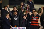 3 December 2023; Ballygunner captains Stephen O'Keeffe, left, and Philip Mahony lift the cup with the help of supporter Tom Mullane after the AIB Munster GAA Hurling Senior Club Championship final match between Ballygunner, Waterford, and Clonlara, Clare, at FBD Semple Stadium in Thurles, Tipperrary. Photo by Brendan Moran/Sportsfile