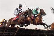 3 December 2023; Hey Johnny, left, with Michael O'Sullivan up, and By Your Side, right, with Jake Coen up, during the Bar One Racing Handicap Hurdle on day two of the Fairyhouse Winter Festival at Fairyhouse Racecourse in Ratoath, Meath. Photo by Seb Daly/Sportsfile