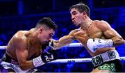 2 December 2023; Michael Conlan, right, and Jordan Gill during their super-featherweight bout at the SSE Arena in Belfast. Photo by Ramsey Cardy/Sportsfile