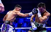 2 December 2023; Jordan Gill, left, and Michael Conlan during their super-featherweight bout at the SSE Arena in Belfast. Photo by Ramsey Cardy/Sportsfile