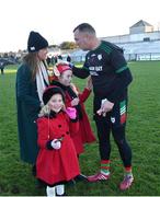 3 December 2023; St Brigid's goalkeeper Cormac Sheehy celebrates with wife Anne, his daughters Emily, front, and Annie after victory in the AIB Connacht GAA Football Senior Club Championship final between St Brigid's, Roscommon, and Corofin, Galway, at Dr Hyde Park in Roscommon. Photo by Piaras Ó Mídheach/Sportsfile