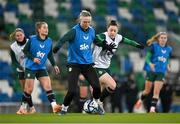 4 December 2023; Louise Quinn and Lucy Quinn, right, during a Republic of Ireland women training session at the National Football Stadium at Windsor Park in Belfast. Photo by Stephen McCarthy/Sportsfile
