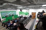 4 December 2023; Interim head coach Eileen Gleeson with Katie McCabe and media officer Gareth Maher during a Republic of Ireland women press conference at the National Football Stadium at Windsor Park in Belfast. Photo by Stephen McCarthy/Sportsfile