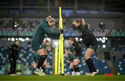 4 December 2023; Diane Caldwell, left, and Kyra Carusa during a Republic of Ireland women training session at the National Football Stadium at Windsor Park in Belfast. Photo by Stephen McCarthy/Sportsfile
