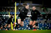 4 December 2023; Saoirse Noonan, right, tracks Lucy Quinn during a Republic of Ireland women training session at the National Football Stadium at Windsor Park in Belfast. Photo by Stephen McCarthy/Sportsfile