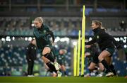 4 December 2023; Diane Caldwell and Kyra Carusa, right, during a Republic of Ireland women training session at the National Football Stadium at Windsor Park in Belfast. Photo by Stephen McCarthy/Sportsfile