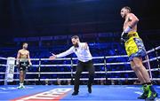 2 December 2023; Referee Hugh Russell Jr, with Sean McComb, right, and Sam Maxwell during their WBO European super lightweight bout at the SSE Arena in Belfast. Photo by Ramsey Cardy/Sportsfile