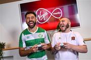 5 December 2023; Virgin Media has been announced as the title partner of the Football Association of Ireland’s Esports programme, including the ELOI which will now be titled the Virgin Media ELOI. Pictured during the announcement at Macken House in Dublin are Roberto Lopes of Shamrock Rovers, left, and E Republic of Ireland player Eric Finn. Photo by Brendan Moran/Sportsfile