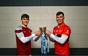 5 December 2023; University of Galway footballer Tommy Conroy, left, and University College Cork footballer Dylan Foley with the Sigerson Cup before the draw for the Electric Ireland GAA Higher Education Championships at Croke Park in Dublin. Photo by Piaras Ó Mídheach/Sportsfile