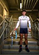 5 December 2023; University of Limerick hurler Colin Coughlan poses for a portrait with the Fitzgibbon Cup before the draw for the Electric Ireland GAA Higher Education Championships at Croke Park in Dublin. Photo by Piaras Ó Mídheach/Sportsfile