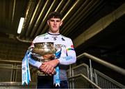 5 December 2023; University of Limerick hurler Colin Coughlan poses for a portrait with the Fitzgibbon Cup before the draw for the Electric Ireland GAA Higher Education Championships at Croke Park in Dublin. Photo by Piaras Ó Mídheach/Sportsfile