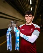 5 December 2023; University of Galway footballer Tommy Conroy poses for a portrait with the Sigerson Cup before the draw for the Electric Ireland GAA Higher Education Championships at Croke Park in Dublin. Photo by Piaras Ó Mídheach/Sportsfile