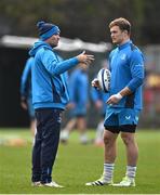 5 December 2023; Senior coach Jacques Nienaber, left, and Josh van der Flier during a Leinster Rugby squad training session at UCD in Dublin. Photo by Brendan Moran/Sportsfile