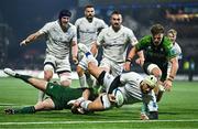 2 December 2023; Charlie Ngatai of Leinster dives over to score his side's first try despite the efforts of JJ Hanrahan, left, and Cian Prendergast of Connacht during the United Rugby Championship match between Connacht and Leinster at The Sportsground in Galway. Photo by Sam Barnes/Sportsfile