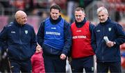 21 October 2023; Ireland manager Damien Coleman, second from left, with his selectors Terence McNaughton, Michael Kavanagh and Kieran Kingston at half-time during the 2023 Hurling Shinty International Game between Ireland and Scotland at Páirc Esler in Newry, Down. Photo by Piaras Ó Mídheach/Sportsfile