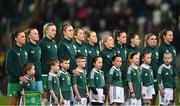 5 December 2023; Republic of Ireland players, including captain Katie McCabe, left, line-up before the UEFA Women's Nations League B match between Northern Ireland and Republic of Ireland at the National Football Stadium at Windsor Park in Belfast. Photo by Ramsey Cardy/Sportsfile