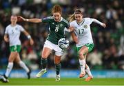 5 December 2023; Marissa Callaghan of Northern Ireland in action against Jamie Finn of Republic of Ireland during the UEFA Women's Nations League B match between Northern Ireland and Republic of Ireland at the National Football Stadium at Windsor Park in Belfast. Photo by Ramsey Cardy/Sportsfile