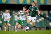 5 December 2023; Sarah McFadden of Northern Ireland in action against Lucy Quinn of Republic of Ireland during the UEFA Women's Nations League B match between Northern Ireland and Republic of Ireland at the National Football Stadium at Windsor Park in Belfast. Photo by Stephen McCarthy/Sportsfile