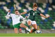 5 December 2023; Marissa Callaghan of Northern Ireland in action against Jamie Finn of Republic of Ireland during the UEFA Women's Nations League B match between Northern Ireland and Republic of Ireland at the National Football Stadium at Windsor Park in Belfast. Photo by Stephen McCarthy/Sportsfile