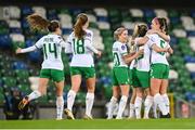 5 December 2023; Republic of Ireland players celebrate after their first goal, scored by Lucy Quinn, hidden, during the UEFA Women's Nations League B match between Northern Ireland and Republic of Ireland at the National Football Stadium at Windsor Park in Belfast. Photo by Stephen McCarthy/Sportsfile