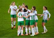 5 December 2023; Republic of Ireland players, including Jamie Finn, 17, and Denise O'Sullivan, 10, celebrate after their first goal, scored by Lucy Quinn, centre, during the UEFA Women's Nations League B match between Northern Ireland and Republic of Ireland at the National Football Stadium at Windsor Park in Belfast. Photo by Ramsey Cardy/Sportsfile