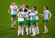 5 December 2023; Republic of Ireland players, including Jamie Finn, 17, and Denise O'Sullivan, 10, celebrate after their first goal, scored by Lucy Quinn, centre, during the UEFA Women's Nations League B match between Northern Ireland and Republic of Ireland at the National Football Stadium at Windsor Park in Belfast. Photo by Ramsey Cardy/Sportsfile