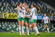 5 December 2023; Heather Payne of Republic of Ireland celebrates with teammates, from second from left, Ruesha Littlejohn, Denise O'Sullivan and Kyra Carusa after scoring their side's second goal during the UEFA Women's Nations League B match between Northern Ireland and Republic of Ireland at the National Football Stadium at Windsor Park in Belfast. Photo by Stephen McCarthy/Sportsfile