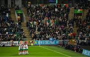 5 December 2023; Republic of Ireland players celebrate their second goal, scored by Heather Payne, hidden, during the UEFA Women's Nations League B match between Northern Ireland and Republic of Ireland at the National Football Stadium at Windsor Park in Belfast. Photo by Ramsey Cardy/Sportsfile