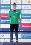 5 December 2023; Daniel Wiffen of Ireland with his gold medal after winning the 400m men’s freestyle during day one of the European Short Course Swimming Championships 2023 at the Aquatics Complex in Otopeni, Romania. Photo by Nikola Krstic/Sportsfile