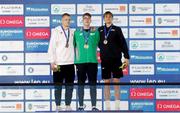 5 December 2023; Gold medallist Daniel Wiffen of Ireland, centre, with silver medallist Danas Rapsys of Lithuania, left, and bronze medallist Lucas Henveaux of Belgium after the 400m men’s freestyle during day one of the European Short Course Swimming Championships 2023 at the Aquatics Complex in Otopeni, Romania. Photo by Nikola Krstic/Sportsfile