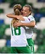 5 December 2023; Kyra Carusa of Republic of Ireland celebrates with Katie McCabe, right, after scoring their side's third goal during the UEFA Women's Nations League B match between Northern Ireland and Republic of Ireland at the National Football Stadium at Windsor Park in Belfast. Photo by Stephen McCarthy/Sportsfile